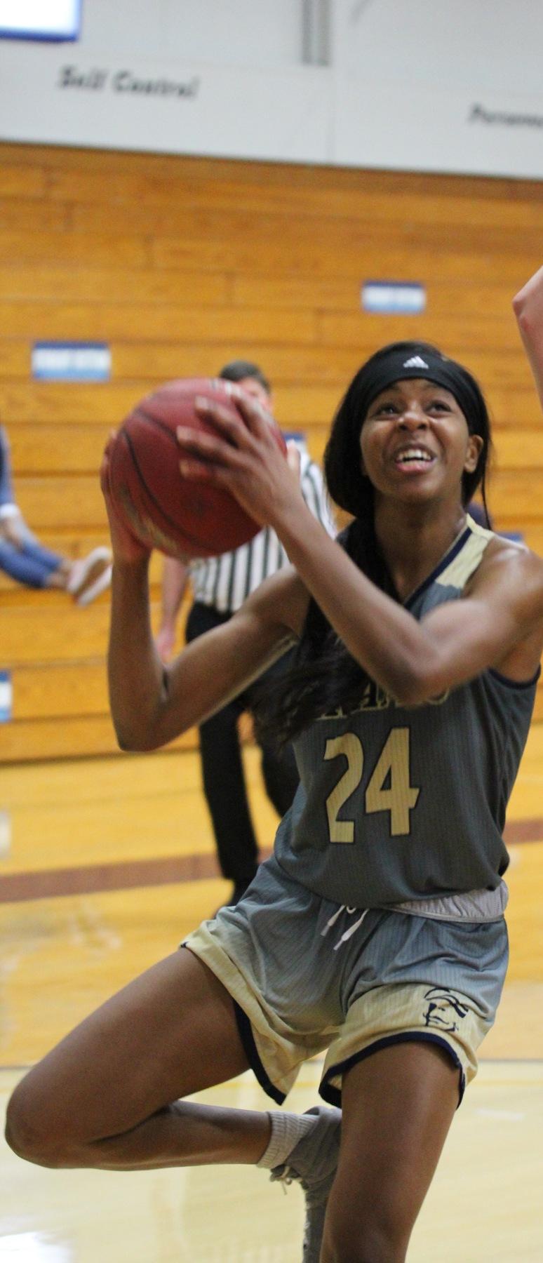 Kierra Crockett (24) goes up for the shot. Photo Credit Nick Dailey